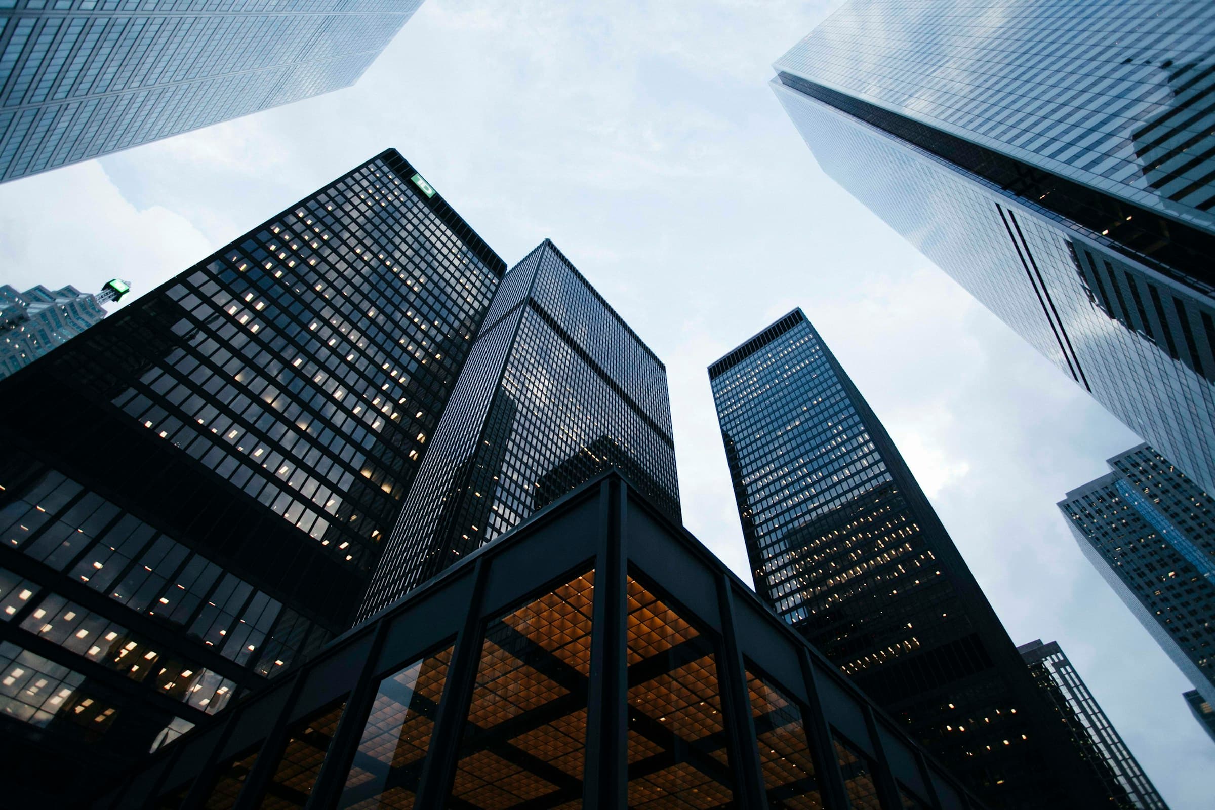 Glass towers rising above a premium business district